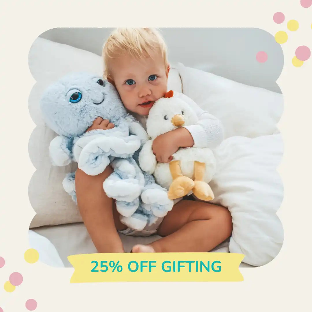 Child hugging plush toys.