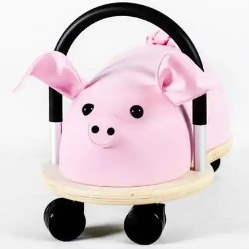 Pink pig ride-on toy.