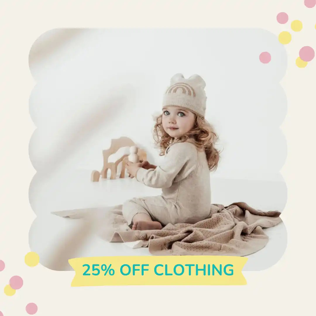 Toddler in beige knitwear.