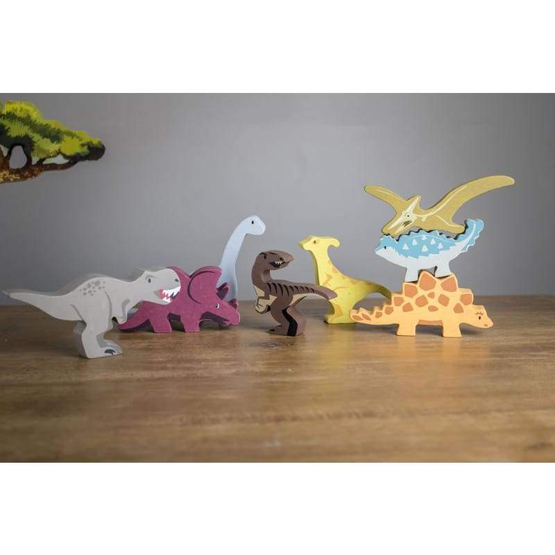 Cellection of 8 wooden dinosaurs made by Tender Leaf Toys
