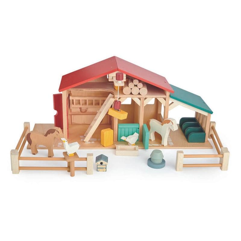 Wooden farm toy set on white background